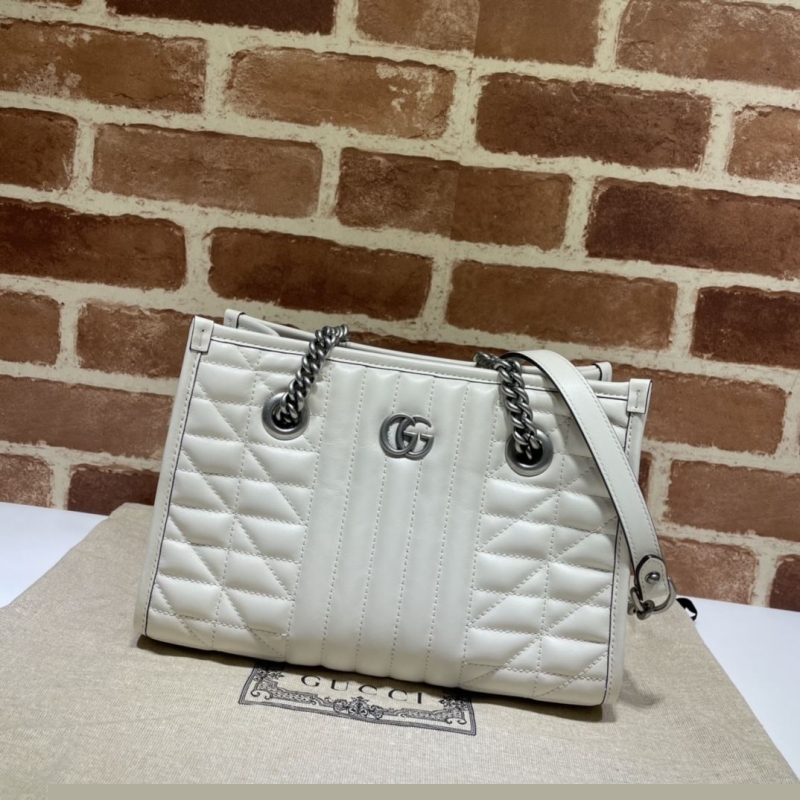 G*u*i shopping bags